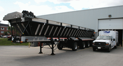 FLO Automatic Greasers on Etnyre Trailers